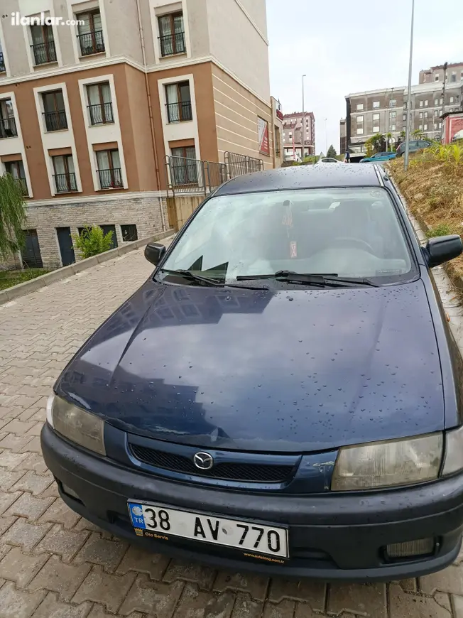 1998 Mazda 323 1.5 benzin & LPG manuel otomobil - Fotoğraf 1