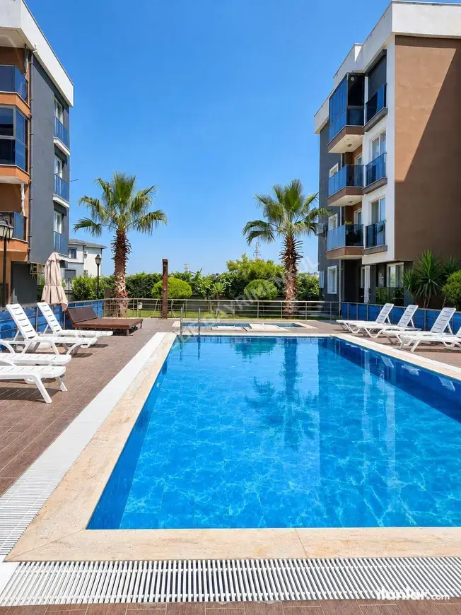 Aydın Kuşadası Davutlar Mahallesi 2+1 85 m² satılık daire - Fotoğraf 1