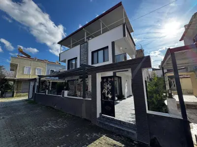 Aydın Kuşadası Davutlar Mahallesi 3+1 135 m² satılık villa - Fotoğraf 1