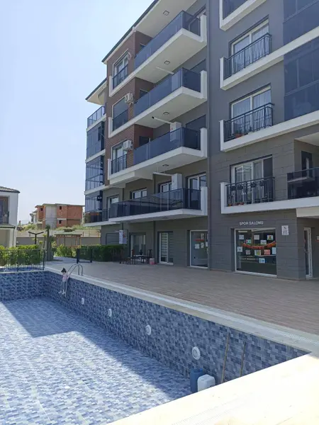 kuşadası değirmendere 2+1 90m2 1.kat 3yıllık satılık residancee daire