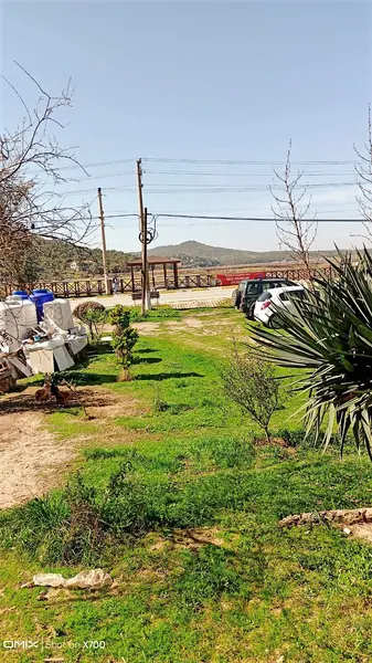 Ayvalık Sarmısaklı'da Cadde üzerinde 2+1 daire
