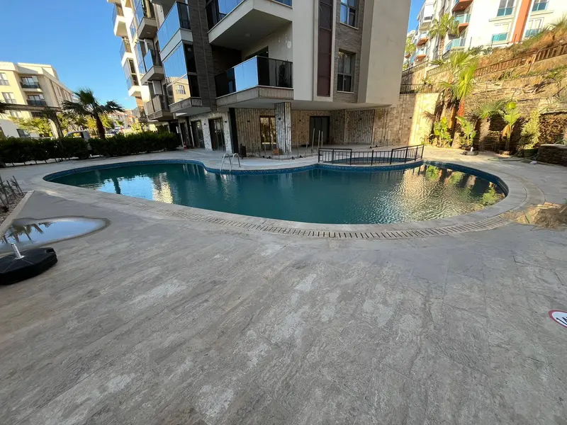 KUŞADASININ BOL OKSİJENLİ 2+1 SIFIR EŞYA SIFIR ARA KAT SATILIK DAİRE